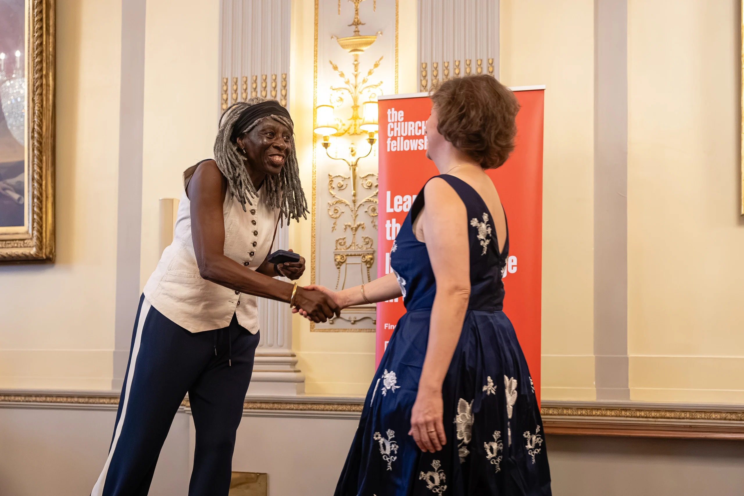 Arabella Tresilian at the Churchill Fellow Award Ceremony 01Oct26 - Receiving my CF medallion from Baroness Lola Young